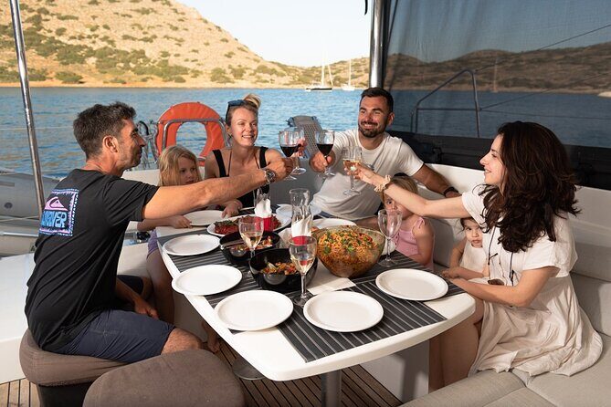 Ag. Nikolaos Catamaran to Spinalonga - Gourmet Meal & Water Toys - Getting on board at Agios Nikolaos: easy meeting, yacht-style comfort