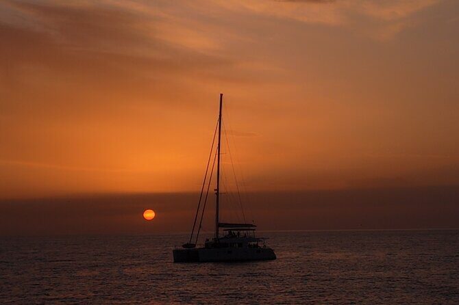 Catamaran Cruise to Dia Island with Meal and Water Activities - Water activities included: SUP, snorkeling gear, and fishing gear
