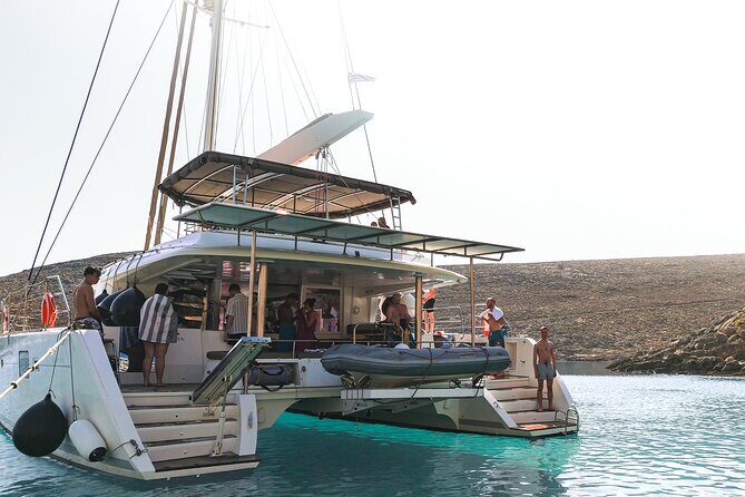 Catamaran Cruise to Dia Island with Meal and Water Activities - Lunch and drinks on board: pasta, seafood, wine, and Greek flavors