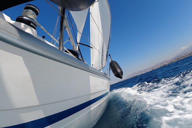 Chania shared Sailing cruise in a small group - The 4-hour rhythm: coastline cruising, island anchor, then back to port