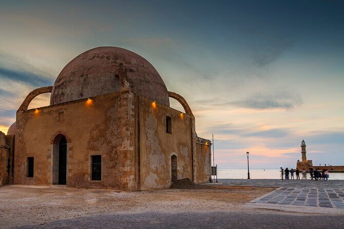 Chania Sunset Hidden gems Tour with diner and wine tasting - Old Venetian Harbor backstreets: myths, alternative bars, and a cooperative with a mission