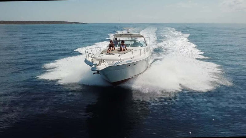 Crete: Chrissi Island Yacht Cruise with Lunch & Snorkeling - Chrissi Island beach time: white sand, protected nature, and manageable walking