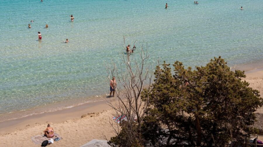 Crete: Full-Day Tour to Voulisma Beach - The real-world considerations: plastic in the water and missing loungers