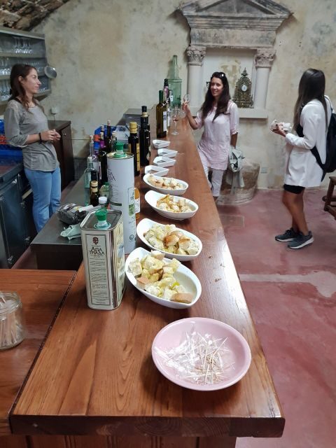 Crete: Heraklion Food and City tour - Mezedopoleio Feast: Eggplant Salad, Roast Goat, Sausage, Olive Oil, Cheese