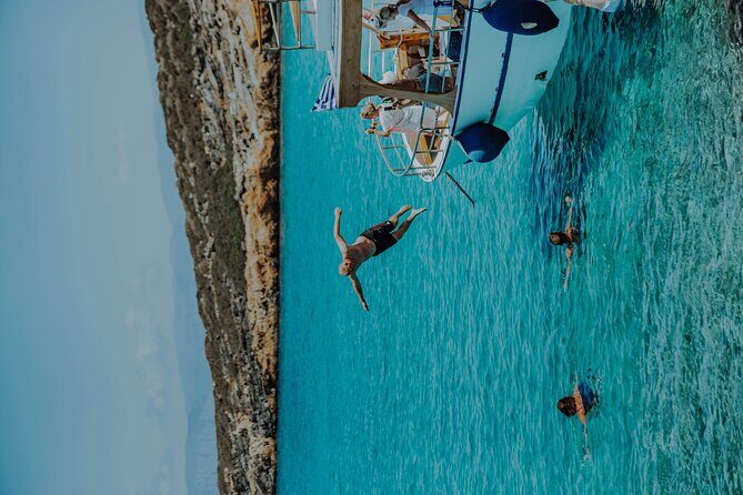 Elounda Boat Trip-The Authentic - Kolokitha Beach: the included hot-dog lunch moment (and the real downtime)