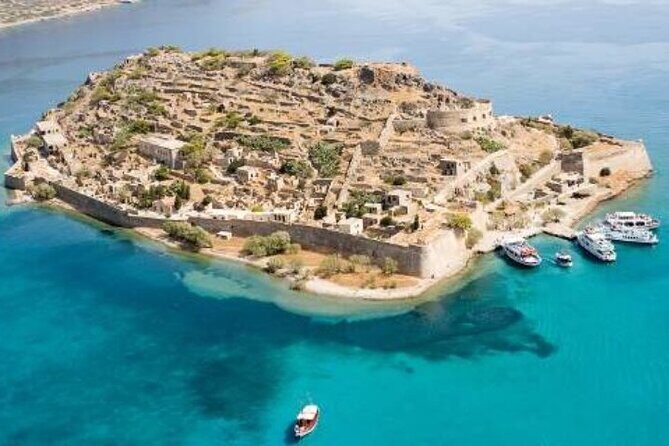 Elounda: Spinalonga Prof. Guided Boat Tour w/ BBQ + Swimming - Elounda coast views and the reason the boat ride is more than transport
