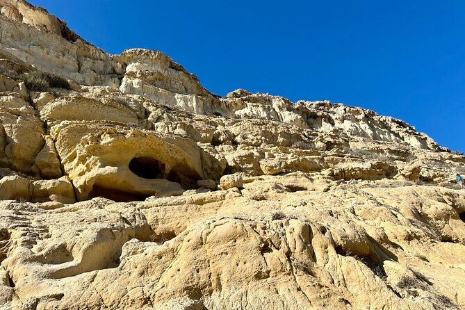 Full-Day Private Tour in Matala Caves and Ancient Gortyn in Crete - Matala Caves: Cliff-Carved Sandstone and That 1960s Echo