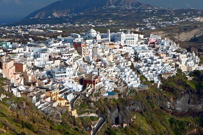 Full-Day Trip to Santorini island by Boat from Rethymno with Transfer your Hotel - Stop 1 on Santorini: blue-and-white towns and that caldera feeling
