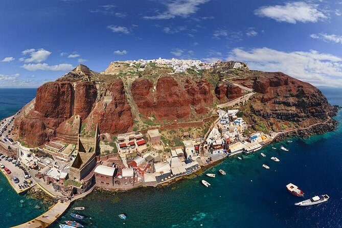 Full-Day Trip to Santorini island by Boat from Rethymno with Transfer your Hotel - Fira in the afternoon: alleys, shops, and volcano-cliff views