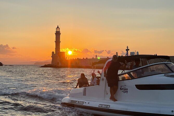 Private Sunset boat trip in Chania, Crete (price is per group) - Passing the Lighthouse of Chania at Sunset Time