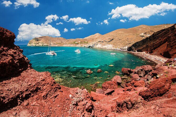 Santorini Full-Day Tour from Heraklion Crete - Perissa Black Sand Beach: swimming time and lunch options